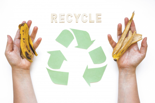 hands-with-trash-near-recycle-word-logo.jpg